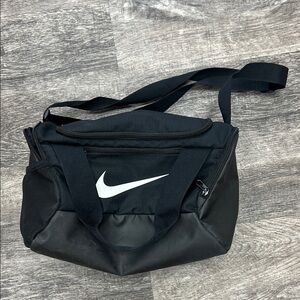 Nike Black Duffel Bag with White Swoosh